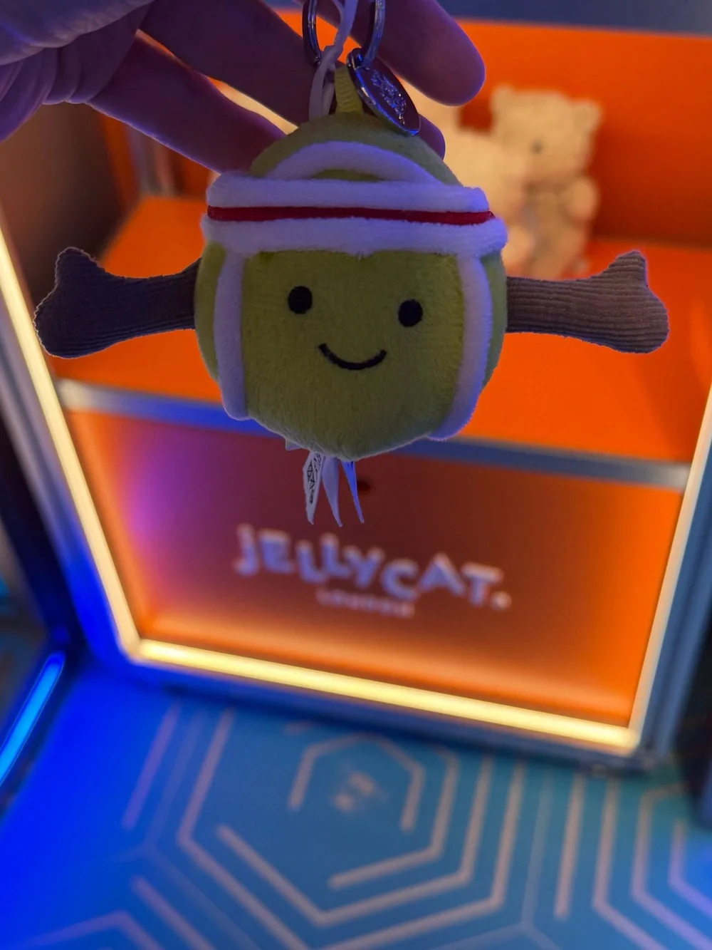 Jellycat Lime Yellow Tennis Ball Keychain with Brown Arms
